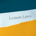 Lemon Laws. Hand opens envelope and takes out documents. Post letter labeled with text