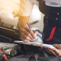 mechanic fixing car