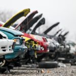 junk cars at auto salvage yard in the city,