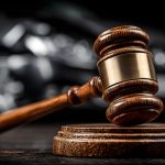 Justice Aftermath: Gavel and Car Wreck. Legal system addressing traffic incidents and personal injury claims in court. Seeking resolution. Accident investigation.